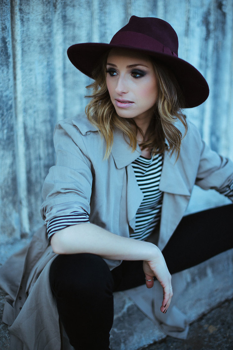 photoshoot whitney krutzfeldt, 70s inspired menswear, mac coat, striped tee, hat, black jeans, moody light, photography8