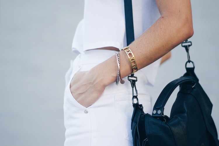 gold roman numeral bracelet, white skirt