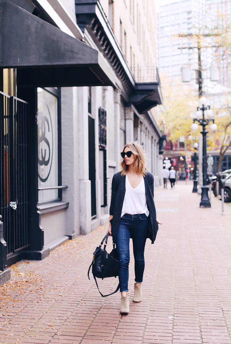 grey cardigan, white v neck, jeans, dicker boots