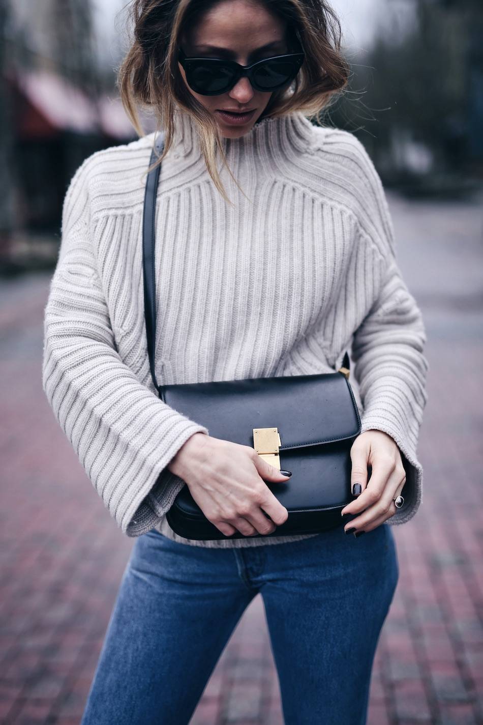 Style and beauty blogger Jill Lansky of The August Diaries Whistler travel diary in Soyer turtleneck and Celine box bag