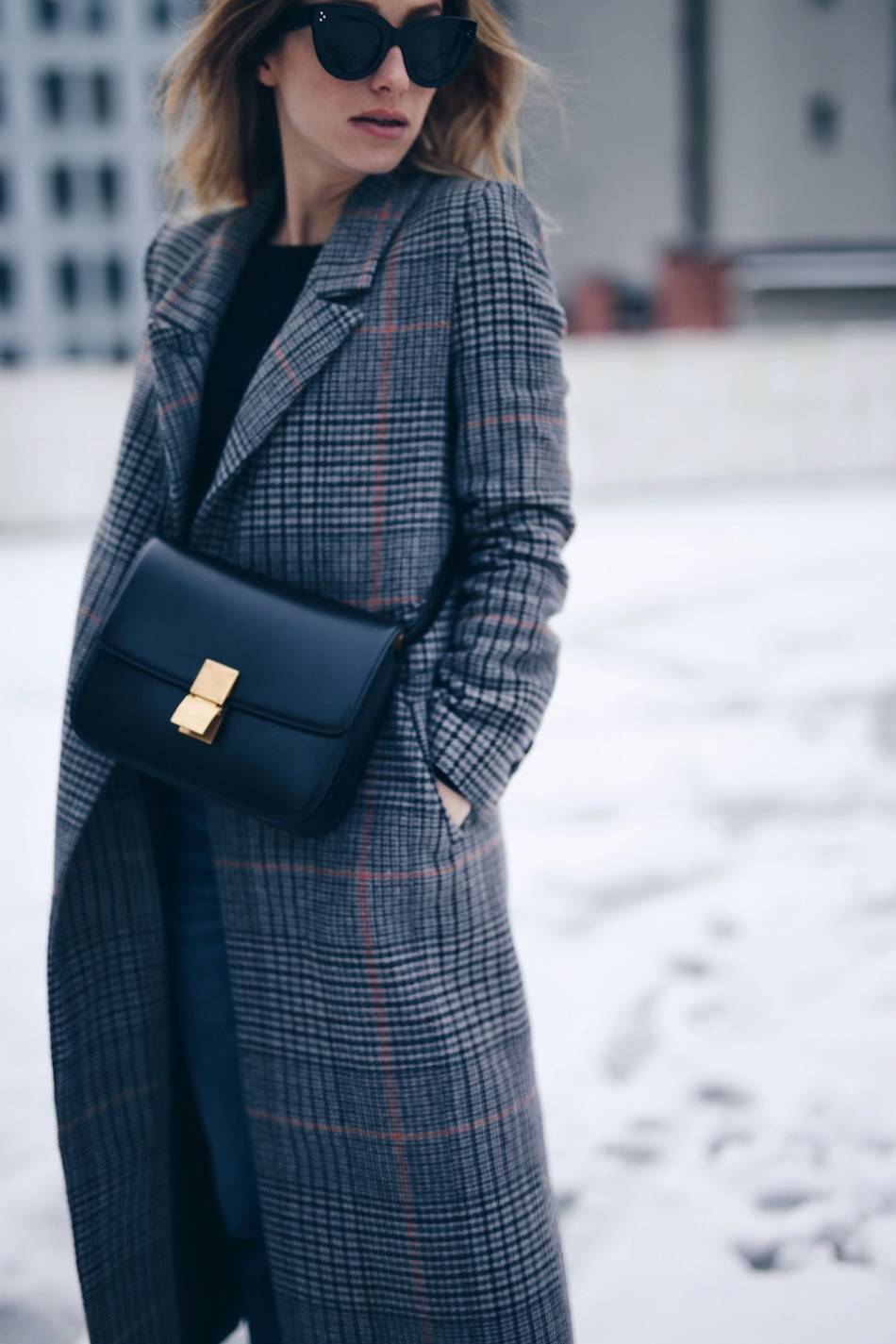 Style and beauty blogger Jill Lansky of The August Diaries in H&M plaid coat with Celine black box bag and Celine Caty sunglasses