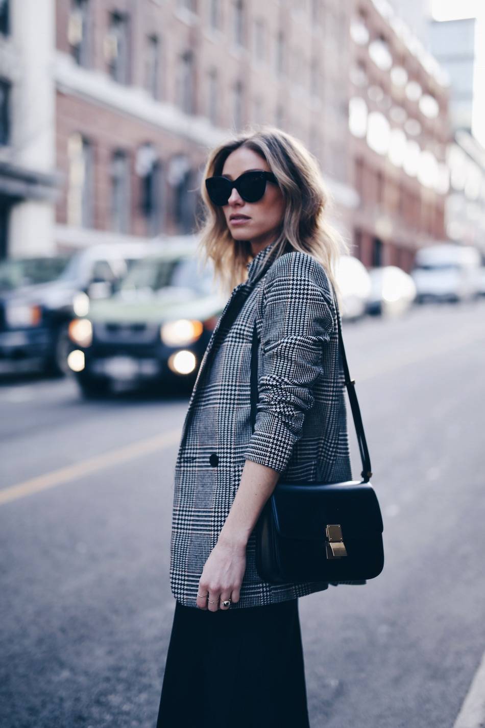 Style and beauty blogger Jill Lansky of The August Diaries in street style plaid boyfriend blazer, Celine medium box bag