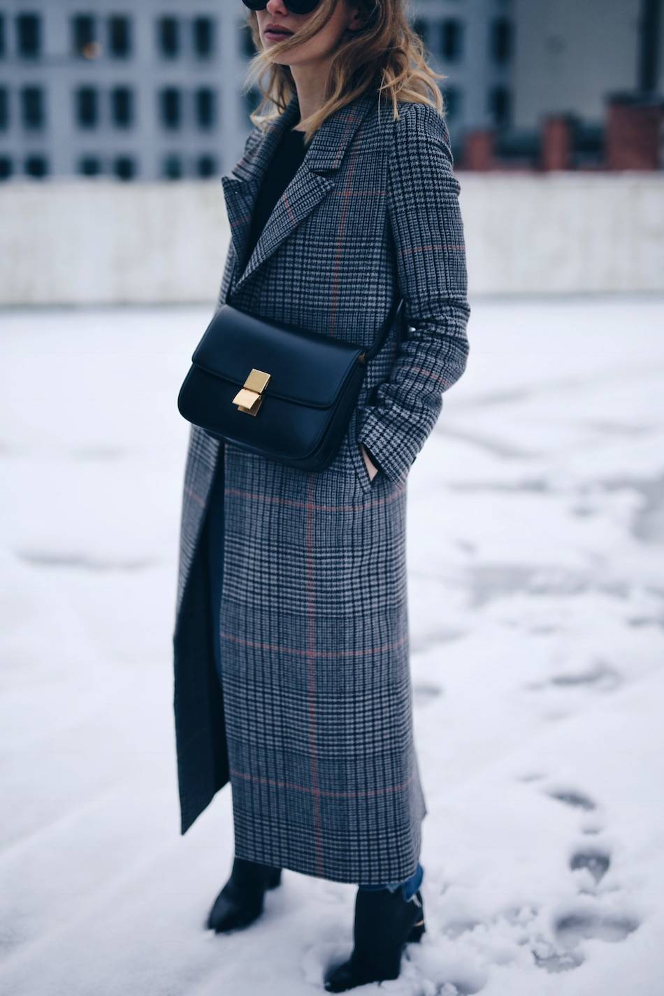 Style and beauty blogger Jill Lansky of The August Diaries shows winter chic style in H&M plaid coat with Celine black box bag