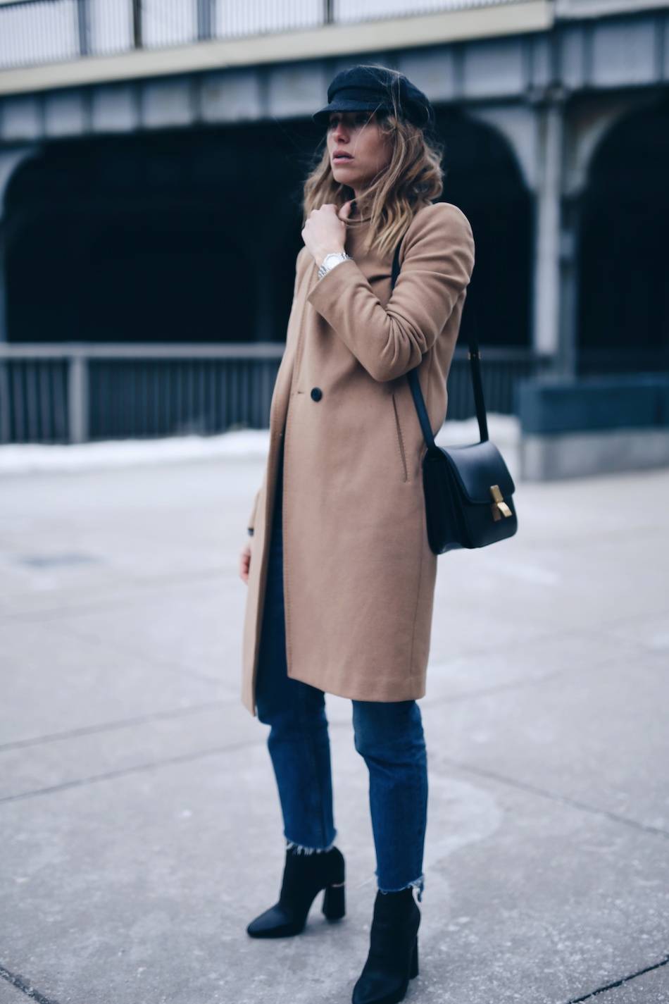 Style and beauty blogger Jill Lansky of The August Diaries Isabel marant Eva newsboy cap, camel coat, jeans, French style, how to dress like a Parisian, tag heuer watch