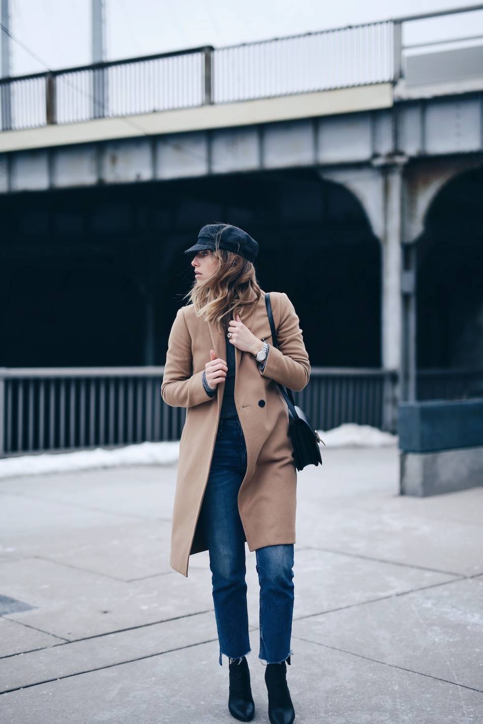 Style and beauty blogger Jill Lansky of The August Diaries Isabel marant Eva newsboy cap, camel coat, jeans, how to dress like a Parisian, tag heuer watch