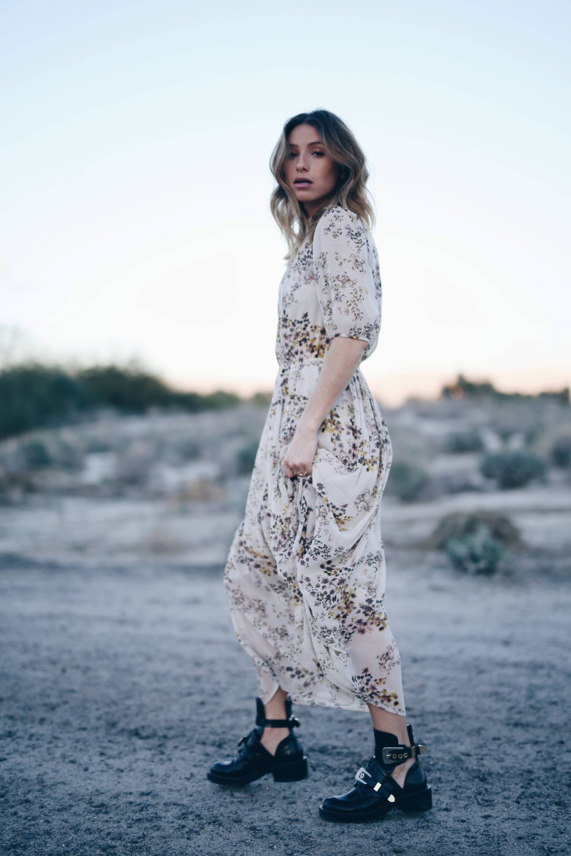 Style and beauty blogger Jill Lansky of The August Diaries in Aritzia silk boho dress, Balenciaga ceinture boots, Palm springs desert editorial