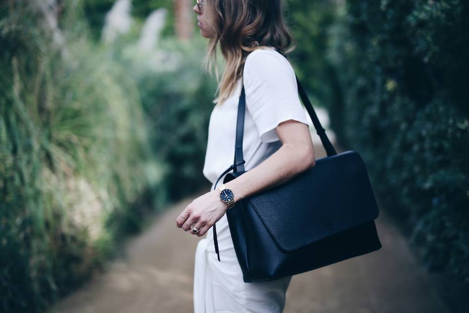 Style and beauty blogger Jill Lansky of The August Diaries in white wrap Stylestalker dress Cluse gold watch Dagne Dover bag at the Parker Palm Springs