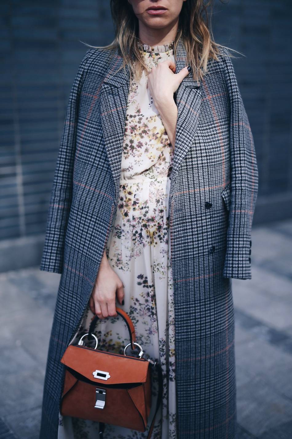 Style and beauty blogger Jill Lansky of The August Diaries on how to layer stylishly in plaid maxi coat, floral dress, Proenza Schouler hava bag