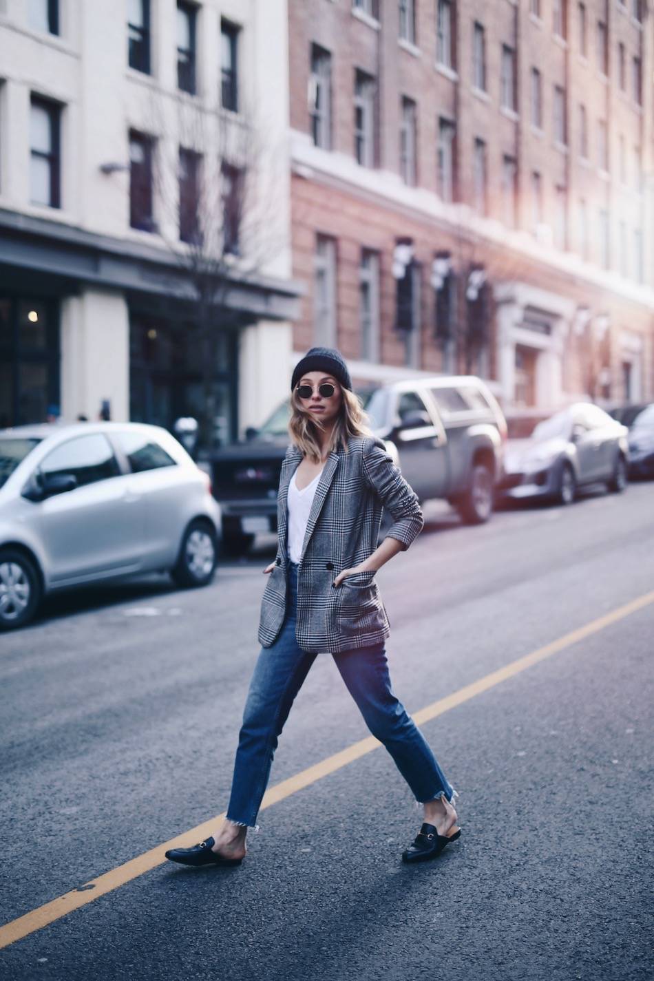 Style and beauty blogger Jill Lansky of The August Diaries on how to take care of luxury bags and shoes in acne studios beanie, boyfriend blazer, how to style gucci black loafers