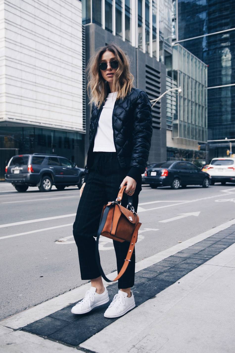 Style and beauty blogger Jill Lansky of The August Diaries on morning routine in athletic fashion trend 2017 Adidas stan smith, bomber jacket, white tee, Proenza Schouler Hava bag