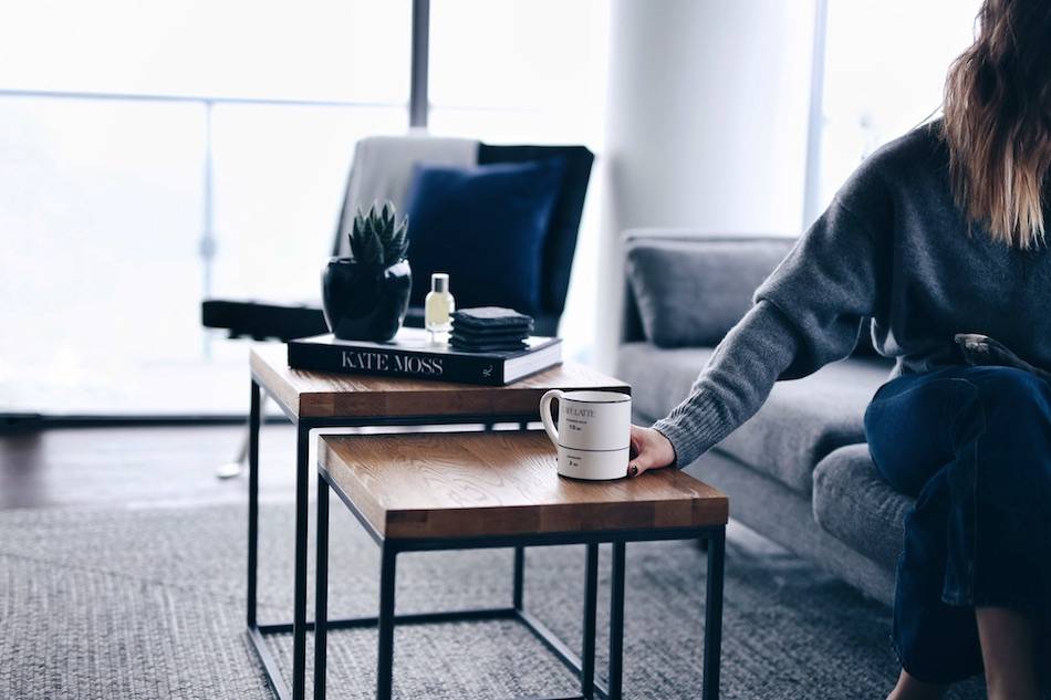 Style and beauty blogger Jill Lansky of The August Diaries shares her simple and minimalist apartment, interior inspiration, Article Taiga tables, grey rug