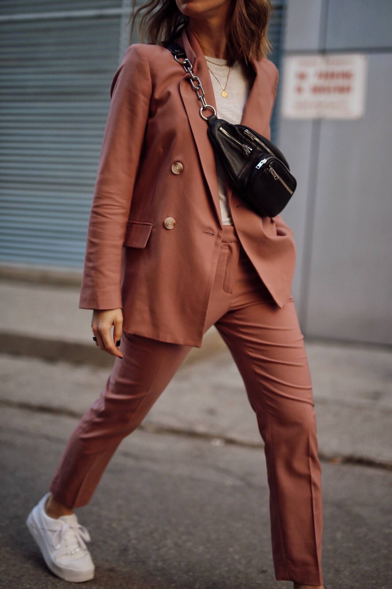 spring outfit ideas, pink suit, nike air force one sage, alexander wang leather fanny pack